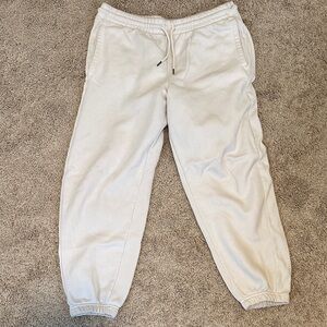 Members mark Women's Cream Joggers gently used.